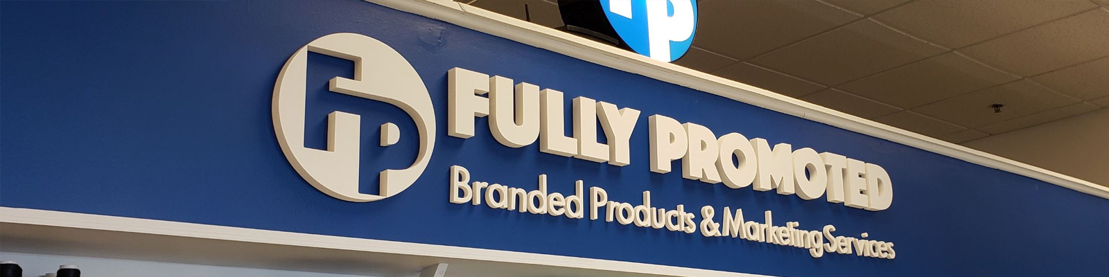 a group of students wearing school-branded hoodies