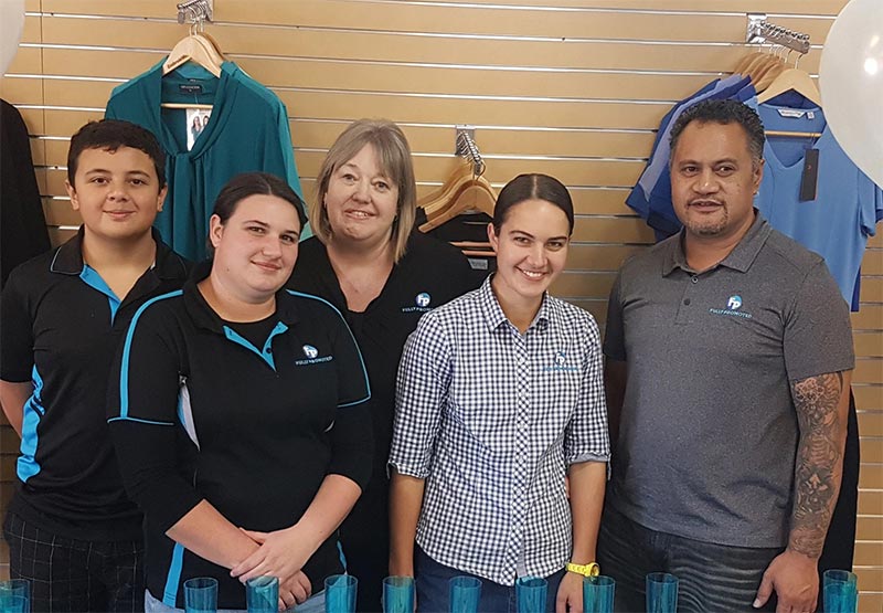 a group wearing branded apparel for a community gathering